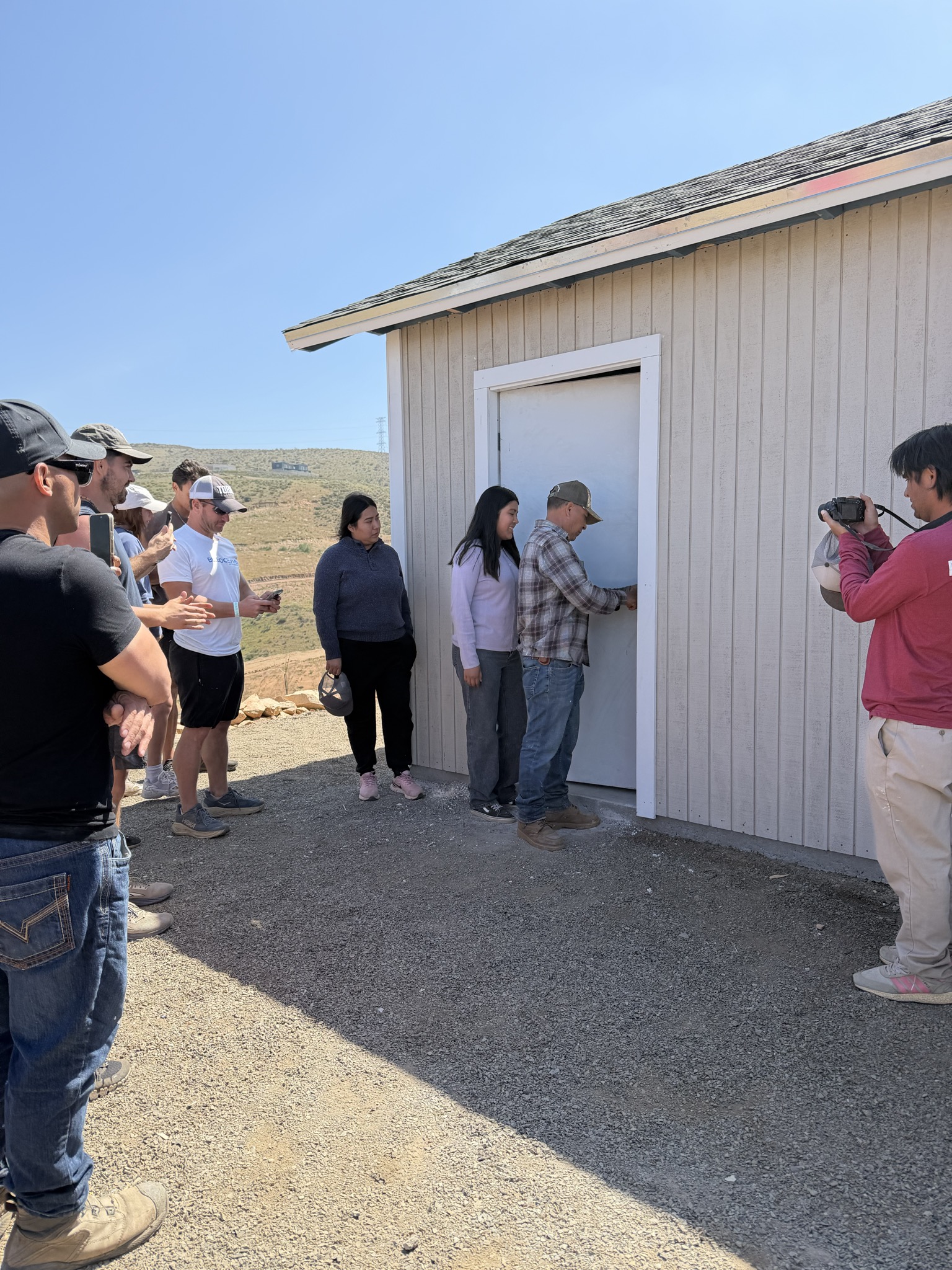 Group dedication at completed house